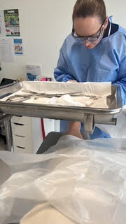 Podiatrist performing nail surgery